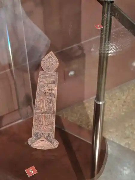 Post-Byzantine carved wooden blessing cross featuring intricate religious symbols and miniature relief scenes